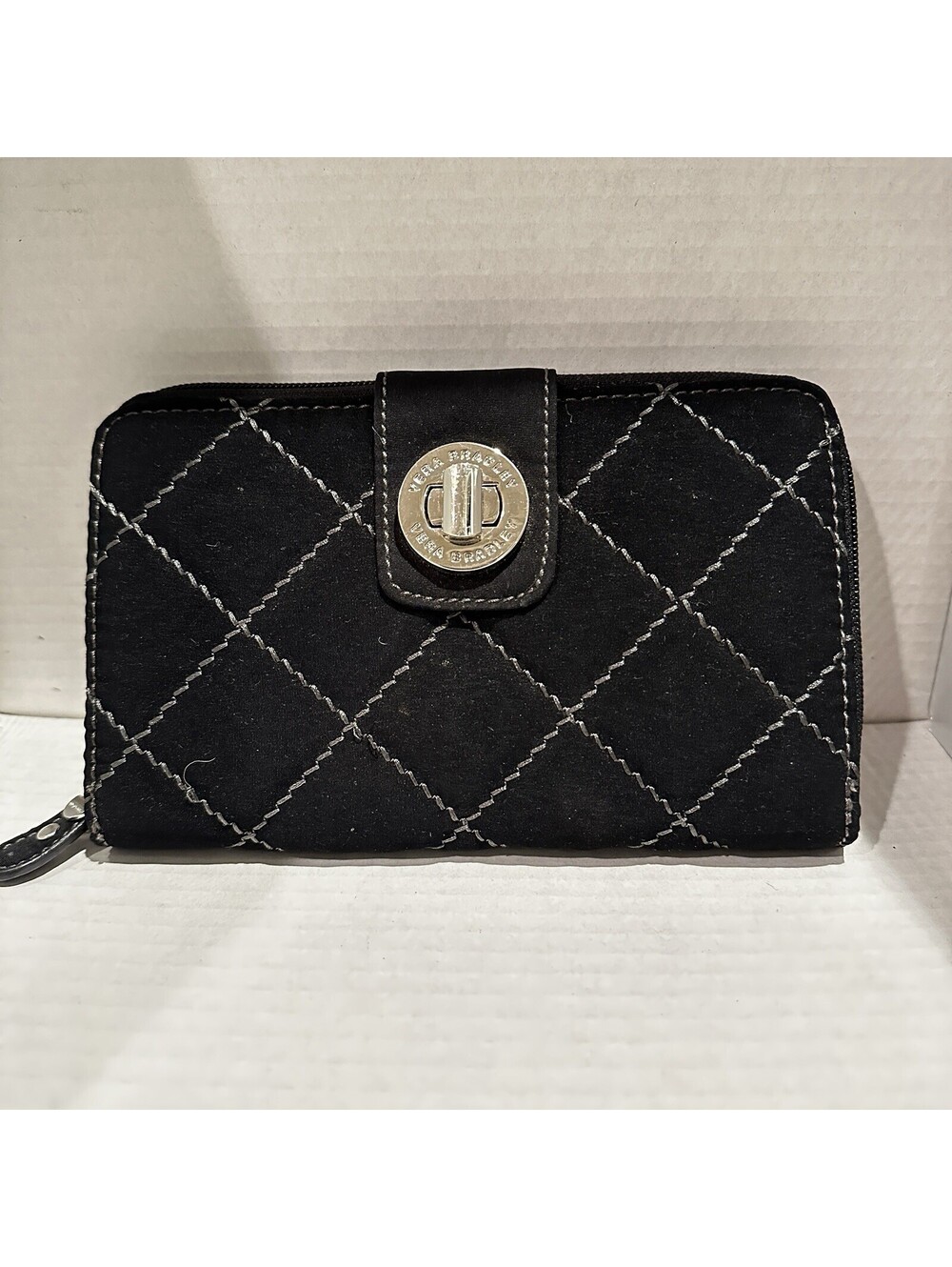 Vera Bradley Zip Around Wallet in Black With Exposed Grey Stitching Quilted Look